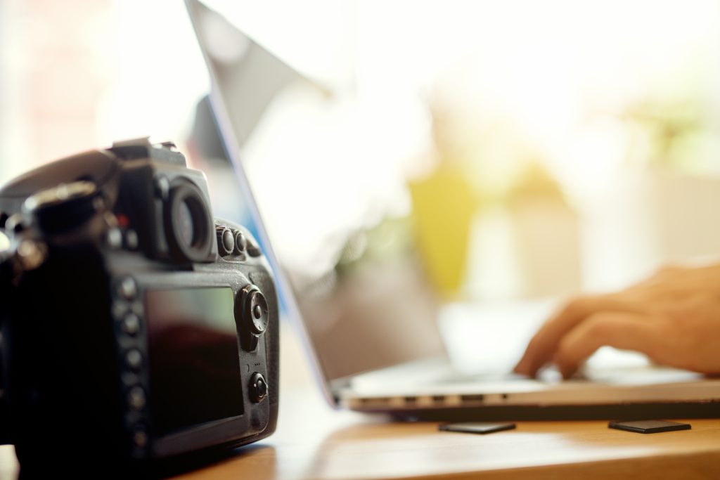 Photographer,Retouching,Photos,On,His,Computer.,Work,In,Progress,After
